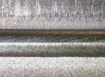 图 4.（a）杯底焊缝正面 